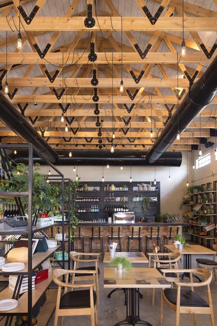 文獻主題餐廳前臺休息區域裝修設計效果圖