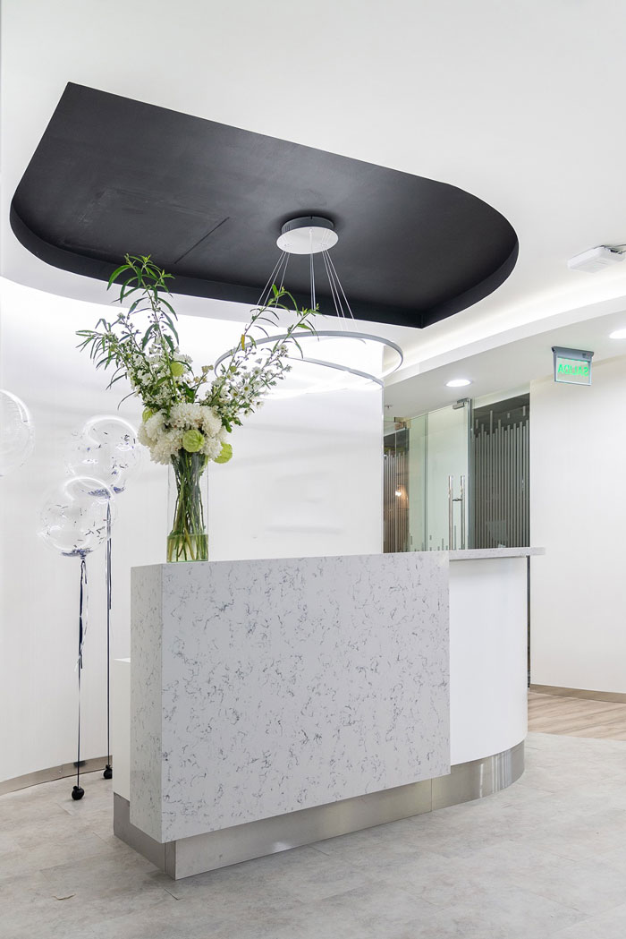 美容公司辦公室前臺裝修設(shè)計(jì)效果圖