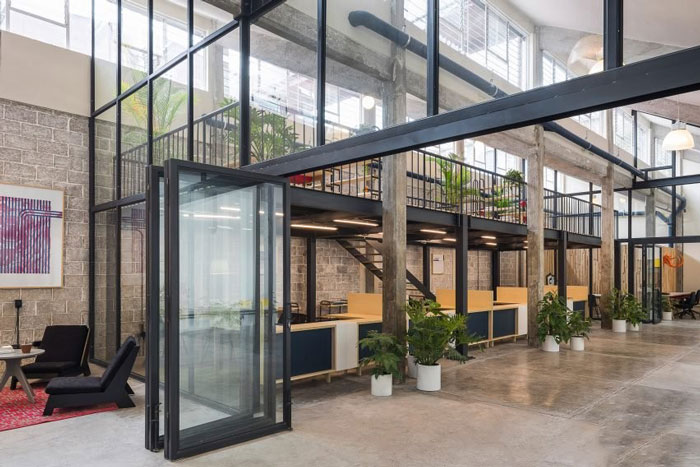 工廠(chǎng)辦公室洽談區(qū)改造裝修設(shè)計(jì)效果圖